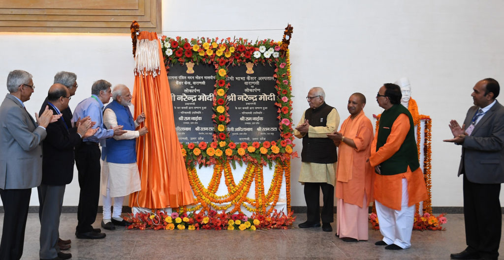 The Prime Minister, Shri Narendra Modi inaugurates Madan Mohan Malaviya Cancer Centre of BHU and Homi Bhabha Cancer Hospital Lehartara, in Varanasi, Uttar Pradesh on February 19, 2019. The Governor of Uttar Pradesh, Shri Ram Naik, the Chief Minister of Uttar Pradesh, Yogi Adityanath and other dignitaries are also seen.